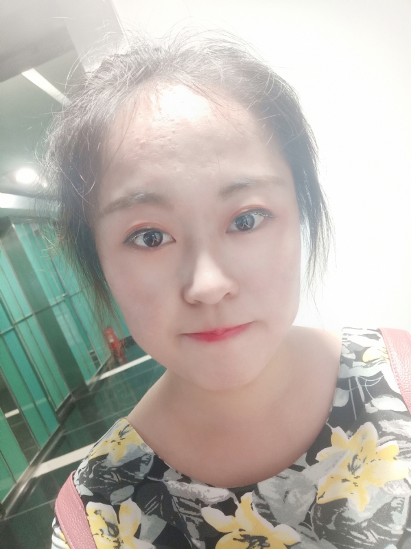 小花伞的第一张照片--驻马店相亲服务中心