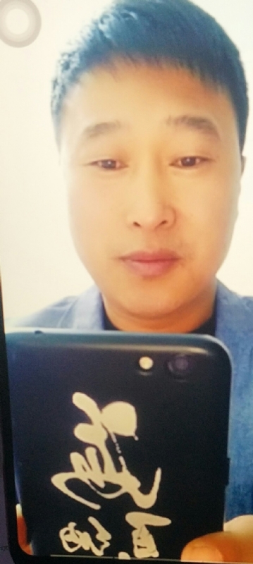 可乐猫的第一张照片--驻马店相亲服务中心