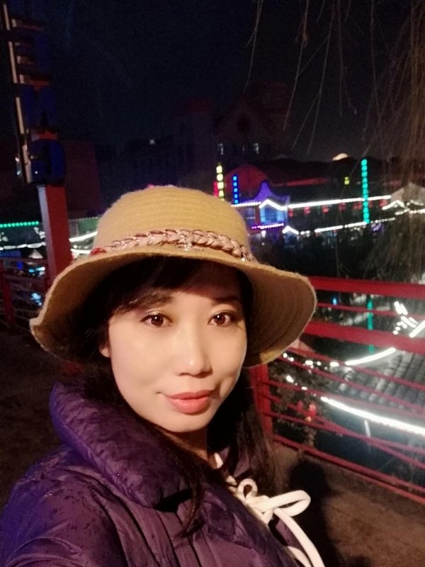 阳光明媚的第一张照片--驻马店相亲服务中心