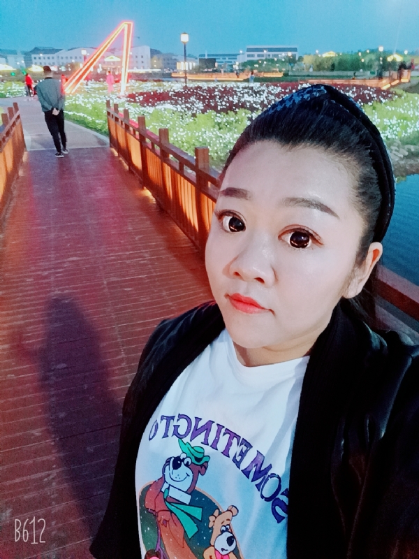 孙晓雪的第一张照片--驻马店相亲服务中心