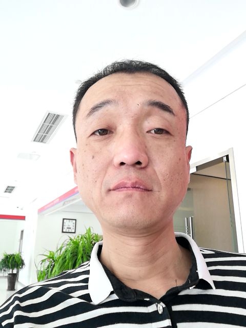 社会你的飞哥的第一张照片--驻马店相亲服务中心