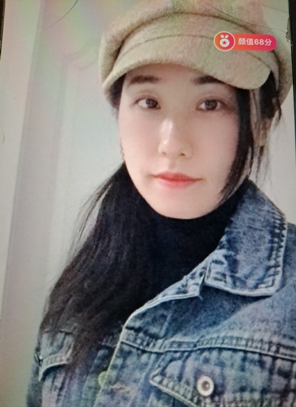 嫣然一笑的第二张照片--驻马店相亲服务中心