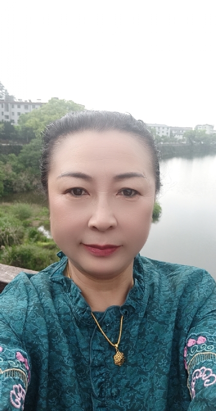 雨中情的第一张照片--驻马店相亲服务中心